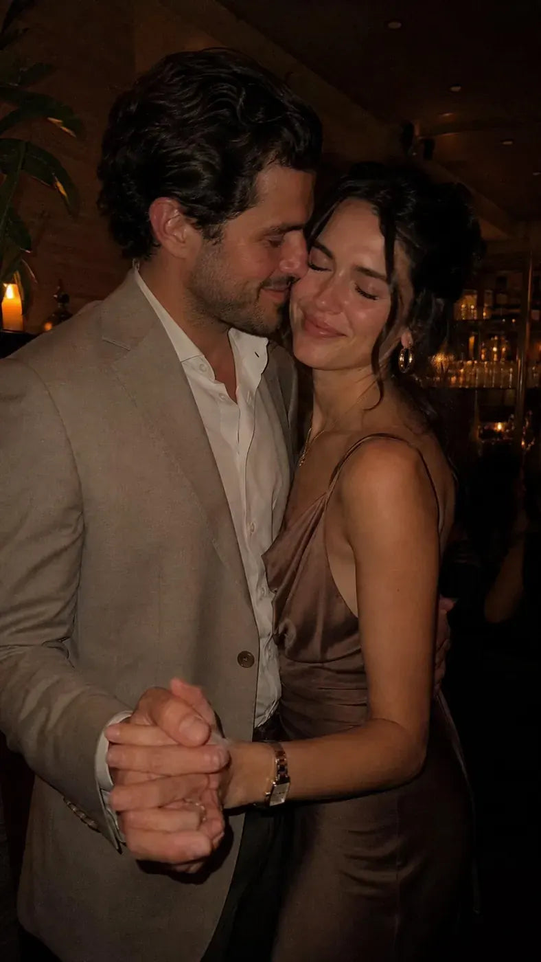 A close slow dance, cheek to temple