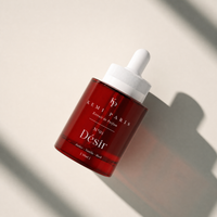 KEMI PARIS N°01 Désir bottle — tilted, window light