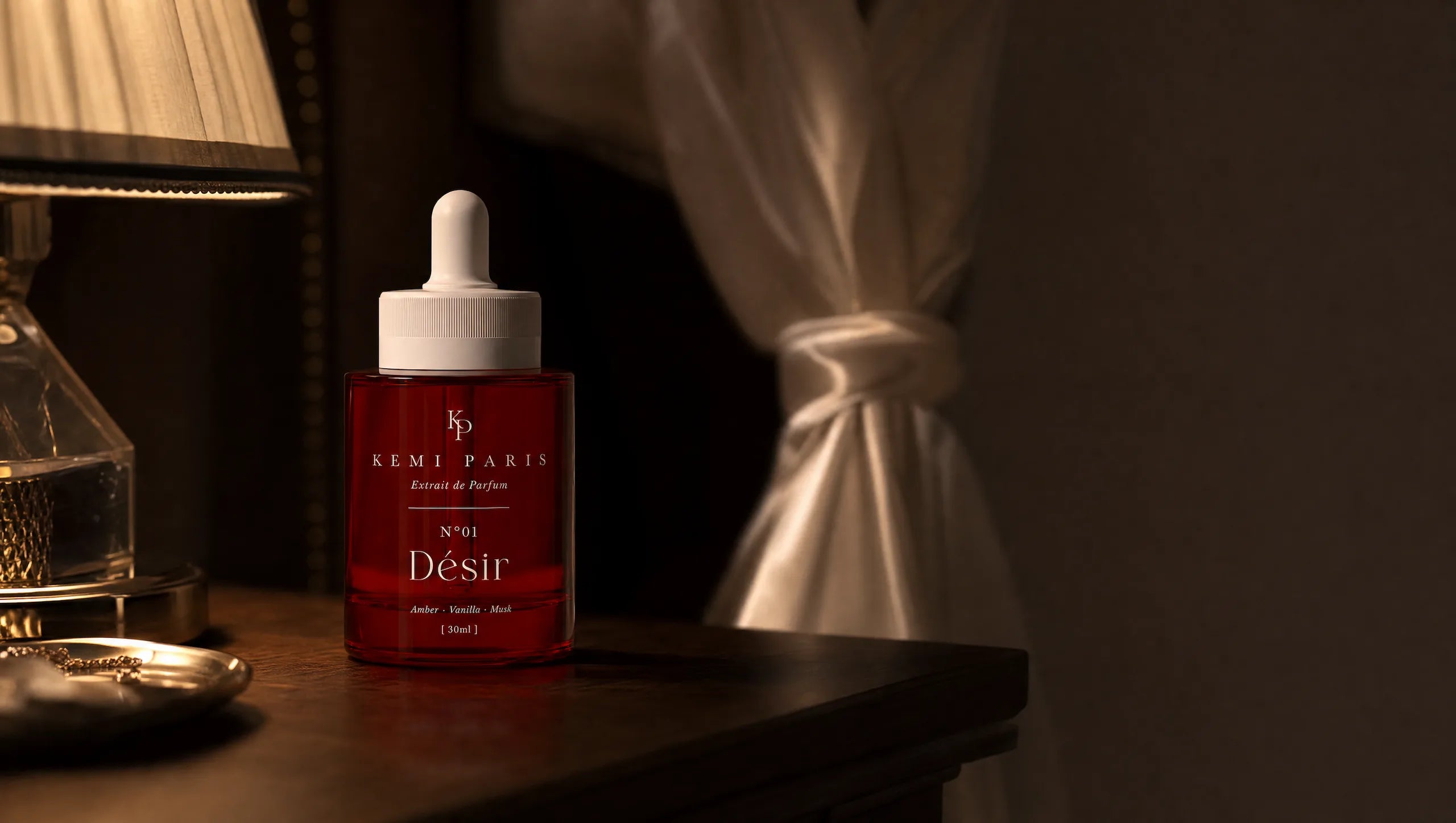 Désir on a bedside table after dark