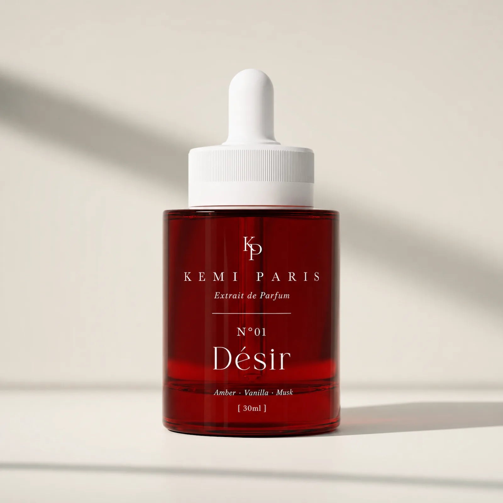 The KEMI PARIS N°01 · Désir red cylinder and its dropper